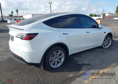 2023 Tesla Model Y Awd/Long Range Dual Motor All-Wheel Drive z USA, uszkodzony, nr VIN 7SAYGDEE0PA135579